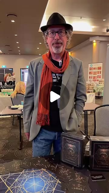 Benjamin Rose standing behind the Creatrix cards and box sets, in the original creator-feature preview.
